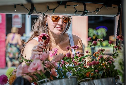 JOHN WOODS / FREE PRESS
Magwyer Herring, who sells her flowers from a 1958 Chevy Apache at markets, was out selling her goods on Corydon Sunday, September 6, 2026.
reporter: dave