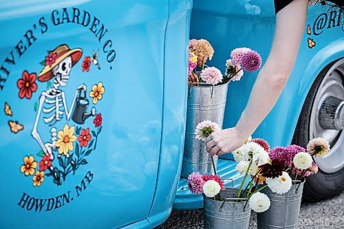 JOHN WOODS / FREE PRESS
Magwyer Herring, who sells her flowers from a 1958 Chevy Apache at markets, was out selling her goods on Corydon Sunday, September 6, 2026.
reporter: dave