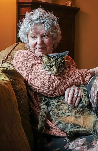 Ruth Bonneville / Free Press
49.8 Seniors and pets
Shannon McGuniga cuddles with her cat Rhythm, one of her four, on her couch next to the window they spend a lot of time at Monday.
Story publication date: upcoming Saturday in September.
Story: 49 8, extended feature, Seniors and companion animals, the benefits and the challenges related to finding affordable pet friendly housing. Pets can enhance well-being, and quality of life for seniors. It is considerably more challenging to find accommodation that will welcome
Story publication date: upcoming Saturday in September.
Sept 15th, 2026