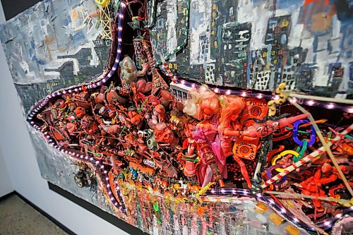 MIKE DEAL / FREE PRESS
Local artist Ryan Smoluk with his solo show, Maze City at Winnipeg Art Gallery (WAG)-Qaumajuq which is on view September 12, 2026 to May 3, 2027.
Detail photo of Smoluk’s piece titled, Horrors of Plastic in the Ocean, 2014, made with wood, concrete, plastic, LED lights, pink florescent paint, found objects.
Reporter: Jen Zoratti
260917 - Thursday, September 17, 2026.