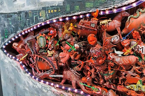 MIKE DEAL / FREE PRESS
Local artist Ryan Smoluk with his solo show, Maze City at Winnipeg Art Gallery (WAG)-Qaumajuq which is on view September 12, 2026 to May 3, 2027.
Detail photo of Smoluk’s piece titled, Horrors of Plastic in the Ocean, 2014, made with wood, concrete, plastic, LED lights, pink florescent paint, found objects.
Reporter: Jen Zoratti
260917 - Thursday, September 17, 2026.