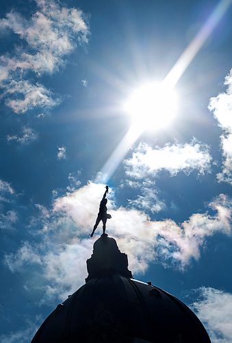 Ruth Bonneville / Free Press
Local Permanent Daylight Saving Time
Photo of the Golden Boy silhouetted against the sky as the afterboon rays of sunshine brilliantly light the skies Thursday.
The Golden Boy is a 5.25-metre gilded statue atop the Manitoba Legislative Building that faces north toward the province's natural resources, holding a sheaf of wheat to symbolize its rich agricultural heritage.
Photo for story on keeping daylight savings time.
Manitoba Will Move to Permanent Daylight Saving Time
After listening to the views of Manitobans on seasonal time changes, the Manitoba government has decided to remain on daylight saving time (DST) permanently, Premier Wab Kinew announced today.
Sept 17th, 2026