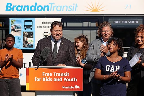 17092026
Flanked by students from George Fitton School, Brandon Mayor Jeff Fawcett and Shannon Vogel, vice-principal for George Fitton, Municipal and Northern Relations Minister Glen Simard speaks during an announcement about free public transit for youth in Brandon on Thursday. (Tim Smith/The Brandon Sun)