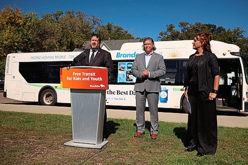 17092026
Municipal and Northern Relations Minister Glen Simard speaks as Brandon Mayor Jeff Fawcett and 
Shannon Vogel, vice-principal for George Fitton School, listen during an announcement about free public transit for youth in Brandon on Thursday. (Tim Smith/The Brandon Sun)