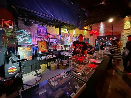 Sheldon Birnie / Free Press
Fans of the band could purchase AC/DC merchandise ahead of Sunday's show, including a wide variety of t-shirts, pins and more.