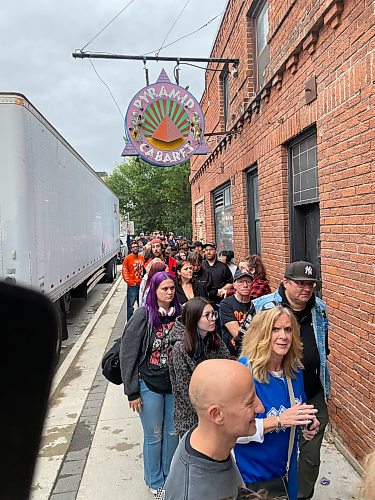 Sheldon Birnie / Free Press
The line to get into the AC/DC PWR/UP event on Friday stretched over a block down Fort Street.