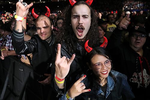 Jason Halstead / Free Press
Front-row fans (from left) Vova Turlak, Andre Bornmann and Luma Lopes
Fans cheer as AC/DC takes the stage at Princess Auto Stadium in Winnipeg on Sept. 20, 2026.