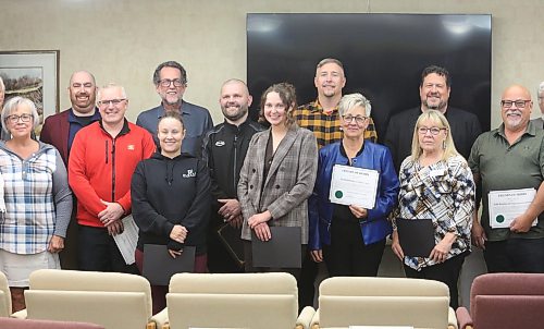 Some donors and supporters of Hobbs Manor hold their appreciation certificates after a donor appreciation event at the seniors' residence on Friday. (Abiola Odutola/The Brandon Sun)