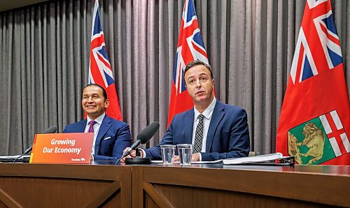 MIKE DEAL / FREE PRESS
Premier Wab Kinew and Finance Minister Adrien Sala announce that the province is on track to balance the budget next year after cutting the deficit in half since the third quarter update as they release the 2025-26 audited public accounts on Monday during a press conference at the Manitoba Legislative Building.
260921 - Monday, September 21, 2026.