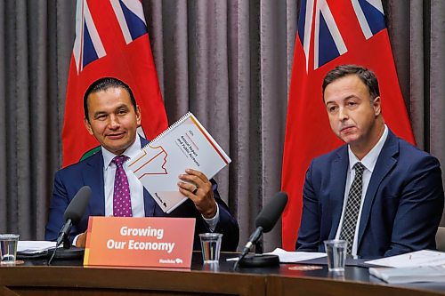 MIKE DEAL / FREE PRESS
Premier Wab Kinew and Finance Minister Adrien Sala announce that the province is on track to balance the budget next year after cutting the deficit in half since the third quarter update as they release the 2025-26 audited public accounts on Monday during a press conference at the Manitoba Legislative Building.
260921 - Monday, September 21, 2026.