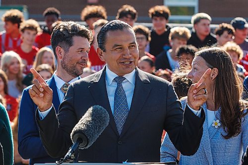 MIKE DEAL / FREE PRESS
Premier Wab Kinew along with Education and Early Childhood Learning Minister Tracy Schmidt, Innovation and New Technology Minister Mike Moroz, and Bruce Sirrell, athletic director, Kelvin High School, hold a press conference in front of many of the students at Kelvin High School to celebrate the groundbreaking of the construction of the new gymnasium and outdoor track.
Reporters: Chris Kitching and Maggie Macintosh
260922 - Tuesday, September 22, 2026.