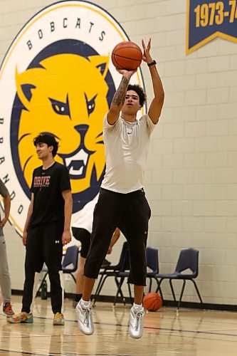 Portland, Ore., native Malik Brown shoots a three-pointer during Brandon University men's basketball practice on Tuesday. The team heads to Regina today to play three exhibition games in three days. (Thomas Friesen/The Brandon Sun)