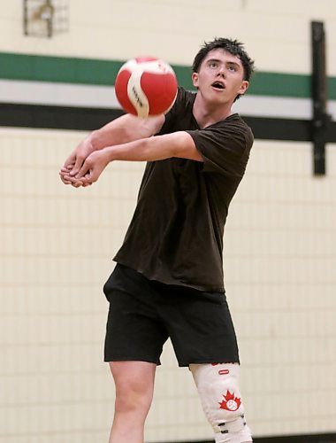 Grade 11 setter Griffin Hargreaves passes a ball during practice last week. (Thomas Friesen/The Brandon Sun)