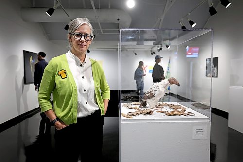 Ruth Bonneville / Free Press

ENT - U of W art exhibit

Photo of Jennifer Gibson, curator of Gallery 1C03, at  U of W Main floor gallery. 

Story:  current exhibit, Lux et Veritas Floreant / Let Light and Truth Flourish, which celebrates the campus galley's 40th anniversary and features art by U of W alumni.

Jen Zoratti Writer, Arts &amp; Life |

Sept 24th,  2026