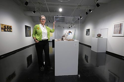 Ruth Bonneville / Free Press
ENT - U of W art exhibit
Photo of Jennifer Gibson, curator of Gallery 1C03, at U of W Main floor gallery.
Story: current exhibit, Lux et Veritas Floreant / Let Light and Truth Flourish, which celebrates the campus galley's 40th anniversary and features art by U of W alumni.
Jen Zoratti Writer, Arts & Life |
Sept 24th, 2026