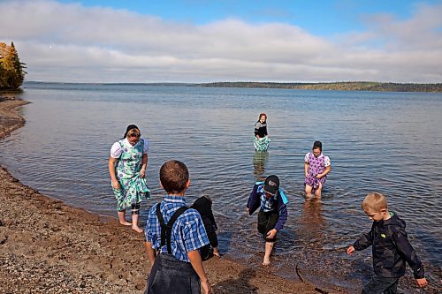 24092026
Students from Riverdale Hutterite Colony near Gladstone brave the cold water while wading in Clear Lake at Wasagaming during a field trip on a warm Thursday afternoon.
(Tim Smith/The Brandon Sun)