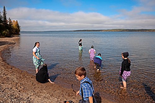 24092026
Students from Riverdale Hutterite Colony near Gladstone brave the cold water while wading in Clear Lake at Wasagaming during a field trip on a warm Thursday afternoon.
(Tim Smith/The Brandon Sun)