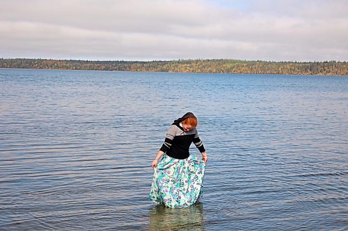 24092026
Jessica Hofer of Riverdale Hutterite Colony near Gladstone braves the cold water while wading in Clear Lake at Wasagaming during a school field trip on a warm Thursday afternoon.
(Tim Smith/The Brandon Sun)
