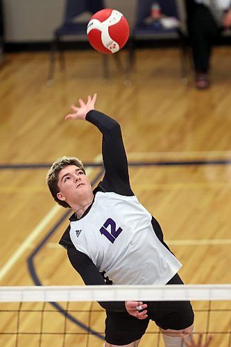 Cohen Folkerts of the Vincent Massey Vikings attacks against the Major Pratt Trojans in the Brandon University high school boys’ volleyball tournament at the Healthy Living Centre on Friday. (Tim Smith/The Brandon Sun)