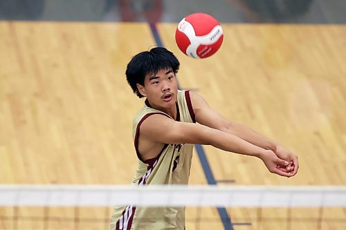 Huasheng Liu of the Crocus Plainsmen passes the ball against the Mennonite Brethren Hawks. (Tim Smith/The Brandon Sun)