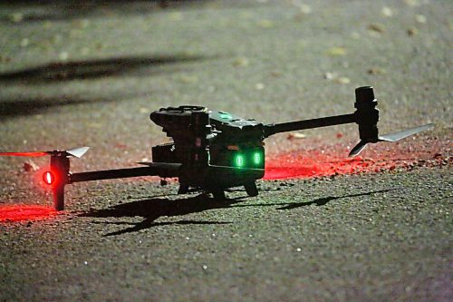 A drone operated by Brandon Police waits to take off from the ground on Whillier Drive during an armed standoff late Thursday evening. Brandon police operated at least two drones over the course of the evening as they staked out a residence one street down on Creighton Boulevard. (Matt Goerzen/The Brandon Sun)