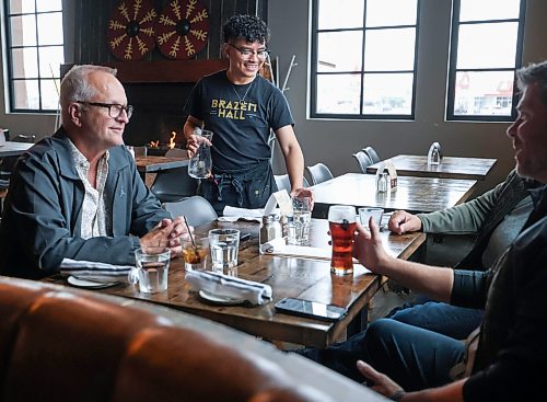 Ruth Bonneville / Free Press
Biz Brazen Hall Restaurant
Charles Inggao, a server at Brazen Hall serves a table Friday afternoon in their dining room prior to the dinner rush.
See story on the data regarding how often Canadians are eating out.
Sept 25th, 2026