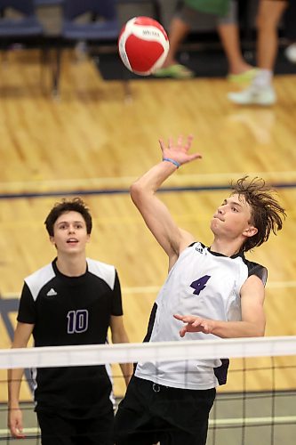 25092026
Jagger Hansen-Young (4) of the Vincent Massey Vikings leaps to put the ball over the net during the Vikings match against the Major Pratt Trojans in the Brandon University high school boys’ volleyball tournament at the Brandon University Healthy Living Centre on Friday.
(Tim Smith/The Brandon Sun)