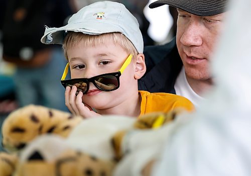 JOHN WOODS / FREE PRESS
Kyle and his son Malakai keep their eyes on their stuffed toy as it gets some care at the Teddy Bear Picnic at Assiniboine Park in Winnipeg, Sunday, September 27, 2026. 

reporter: standup