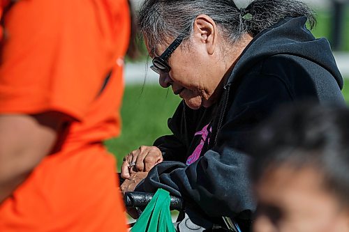 JOHN WOODS / FREE PRESS
A moment of silence during a National Day of Truth and Reconciliation event at the Winnipeg Police Service north district station in Winnipeg, Sunday, September 27, 2026. 

reporter: malak