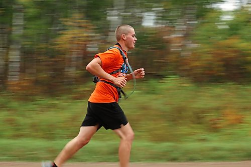 28092026
A runner passes by colourful fall foliage while taking part in the fifth annual Reconciliation Run half marathon from the former Birtle Residential School site to Birdtail Sioux First Nation on Saturday.
(Tim Smith/The Brandon Sun)