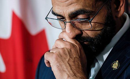 Obby Khan fights back tears as he announces his resignation as leader and member of the Manitoba Progressive Conservative party in his legislature office in Winnipeg on Monday. (John Woods/Winnipeg Free Press)