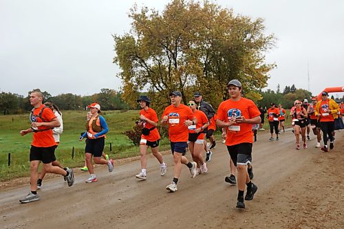 28092026
Runners begin their half-marathon run from just south of the Birtle Residential School site to Birdtail Sioux First Nation while participating in the fifth annual Reconciliation Run on Saturday. The annual run is held in honour of residential school survivors and all who never made it home from the schools.
(Tim Smith/The Brandon Sun)