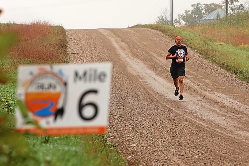 28092026
Luther Alexander of Pine Creek First Nation and Winnipeg runs through the prairie while taking part in the fifth annual Reconciliation Run half marathon from the former Birtle Residential School site to Birdtail Sioux First Nation on Saturday. Alexander was the first runner to cross the finish line.
(Tim Smith/The Brandon Sun)