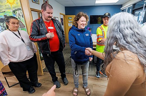 MIKE DEAL / FREE PRESS
Families Minister Nahanni Fontaine is greeted by Cultural Helpers at Initiatives for Just Communities (IJC) (from left): Jerilyn Pitzel, Stephane Hannah-Eckberg, and Ashley Fisher before announcing that the province is strengthening the support system available for young adults aging out of Child and Family Services (CFS) care by investing $1.7-Million as part of its broader commitment to reduce poverty, prevent homelessness and improve outcomes for vulnerable Manitobans, during a press conference at Initiatives for Just Communities, 555 Broadway, on Monday morning.
Reporter: Nicole Buffie
260928 - Monday, September 28, 2026.