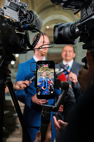 MIKE DEAL / FREE PRESS
Premier Wab Kinew and newly minted ministers responsible for first responder initiatives, David Pankratz, and accessibility, Carla Compton, scrum with the media.
Premier Wab Kinew expands cabinet with two new ministerial responsibilities focused on key priorities of first responders and accessibility during a swearing in ceremony at the Manitoba Legislative building Monday afternoon.
Carla Compton, MLA for Tuxedo and a registered nurse, will serve as minister responsible for accessibility.
David Pankratz, MLA for Waverley and a former firefighter, will serve as minister responsible for first responder initiatives.
Reporter: Nicole Buffie
260928 - Monday, September 28, 2026.