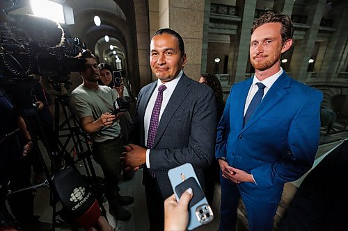 MIKE DEAL / FREE PRESS
Premier Wab Kinew and newly minted ministers responsible for first responder initiatives, David Pankratz, and accessibility, Carla Compton, scrum with the media.
Premier Wab Kinew expands cabinet with two new ministerial responsibilities focused on key priorities of first responders and accessibility during a swearing in ceremony at the Manitoba Legislative building Monday afternoon.
Carla Compton, MLA for Tuxedo and a registered nurse, will serve as minister responsible for accessibility.
David Pankratz, MLA for Waverley and a former firefighter, will serve as minister responsible for first responder initiatives.
Reporter: Nicole Buffie
260928 - Monday, September 28, 2026.