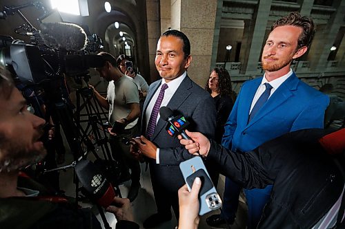 MIKE DEAL / FREE PRESS
Premier Wab Kinew and newly minted ministers responsible for first responder initiatives, David Pankratz (right), and accessibility, Carla Compton (centre), scrum with the media.
Premier Wab Kinew expands cabinet with two new ministerial responsibilities focused on key priorities of first responders and accessibility during a swearing in ceremony at the Manitoba Legislative building Monday afternoon.
Carla Compton, MLA for Tuxedo and a registered nurse, will serve as minister responsible for accessibility.
David Pankratz, MLA for Waverley and a former firefighter, will serve as minister responsible for first responder initiatives.
Reporter: Nicole Buffie
260928 - Monday, September 28, 2026.