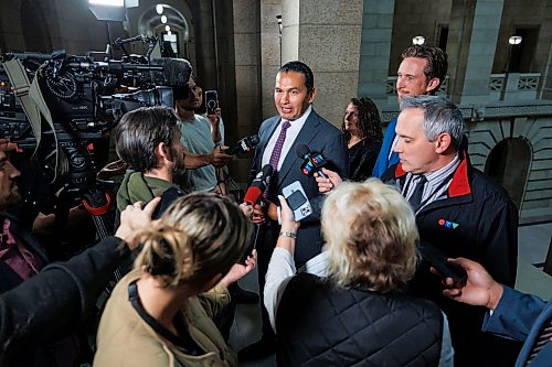 MIKE DEAL / FREE PRESS
Premier Wab Kinew and newly minted ministers responsible for first responder initiatives, David Pankratz, and accessibility, Carla Compton, scrum with the media.
Premier Wab Kinew expands cabinet with two new ministerial responsibilities focused on key priorities of first responders and accessibility during a swearing in ceremony at the Manitoba Legislative building Monday afternoon.
Carla Compton, MLA for Tuxedo and a registered nurse, will serve as minister responsible for accessibility.
David Pankratz, MLA for Waverley and a former firefighter, will serve as minister responsible for first responder initiatives.
Reporter: Nicole Buffie
260928 - Monday, September 28, 2026.
