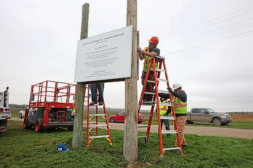 29092026
Workers with the City of Brandon install signs at the entrance to the former Turtle Crossing Campground along Grand Valley Road on Tuesday morning, announcing that the site will no longer be a campground in the wake of the purchase of the property by the province of Manitoba in partnership with the City of Brandon. The property has long been known to hold the graves of children who attended the nearby Brandon Residential School. The Brandon Residential School opened in 1895 and closed in 1972.
(Tim Smith/The Brandon Sun)