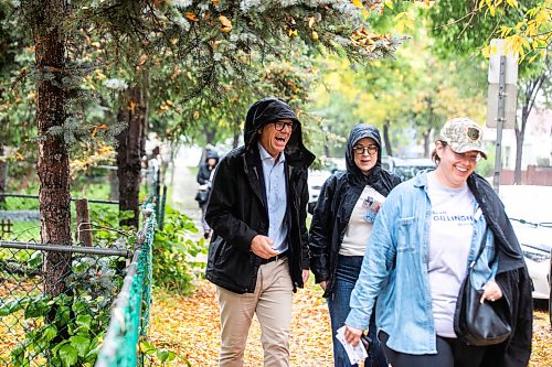 MIKAELA MACKENZIE / FREE PRESS
	
Scott Gillingham leaves ARTlington with Marla Gillingham and Caitlin MacGregor on Saturday, Sept. 26, 2026.

For Malak day-in-the-life story.
Free Press 2026