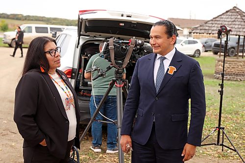 29092026
Manitoba Premier Wab Kinew visits with Sioux Valley Dakota Nation Chief Jennifer Bone at the site of the former Turtle Crossing Campground along Grand Valley Road on Tuesday. The province announced Tuesday that they had purchased the former campground in partnership with the City of Brandon. The property has long been known to hold the graves of children who attended the nearby Brandon Residential School. The Brandon Residential School opened in 1895 and closed in 1972. The Brandon Residential School Missing Children Investigation, an indigenous-led initiative by SVDN, will conduct an extensive search of the property. 
(Tim Smith/The Brandon Sun)