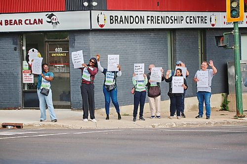 Holding handmade protest signs, several Dynacare lab workers in Brandon took to the picket line at the busy Sixth Street and Princess Avenue intersection on Tuesday morning in an attempt to gain public support. The group was among a total of 350 Dynacare workers who walked off the job across the province. The workers have not had a contract since April 1, and the Manitoba Association of Health Care Professionals says contract talks collapsed on Friday over a company refusal to raise wages. (Matt Goerzen/The Brandon Sun)