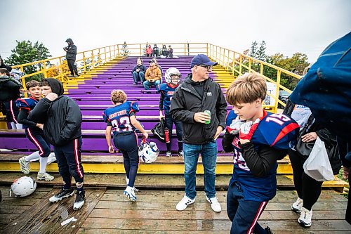 MIKAELA MACKENZIE / FREE PRESS
	
Scott Gillingham watches a game as the U12 team players prepare for their next game at Broncos family day on Saturday, Sept. 26, 2026.

For Malak day-in-the-life story.
Free Press 2026