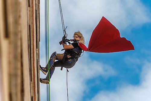 MIKE DEAL / FREE PRESS
Doug Darling , dressed as Thor rappels down the side of the HSC Children’s Hospital during the fifth anniversary of the Suspended Superheroes event Friday afternoon.
Reporter: Kelly-Anne Riess 
261002 - Friday, October 02, 2026.