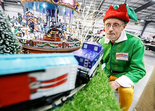 JOHN WOODS / FREE PRESS
Wayne Hillsden checks his Christmas train display as people participate in the annual Manitoba Hobby Expo at Red River Exhibition Park in Winnipeg, Sunday, October 4, 2026.
reporter: standup