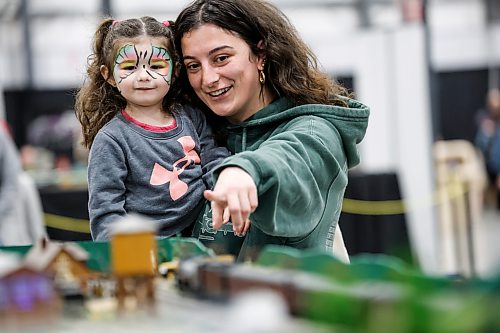 JOHN WOODS / FREE PRESS
Kaitlin and her young cousin Kiana look at the model trains as people participate in the annual Manitoba Hobby Expo at Red River Exhibition Park in Winnipeg, Sunday, October 4, 2026.
reporter: standup