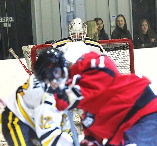 Cooper Dryden stares down the puck on a faceoff in his own end against the Kenora Thistles on Saturday (Rowan McCarthy/The Brandon Sun).