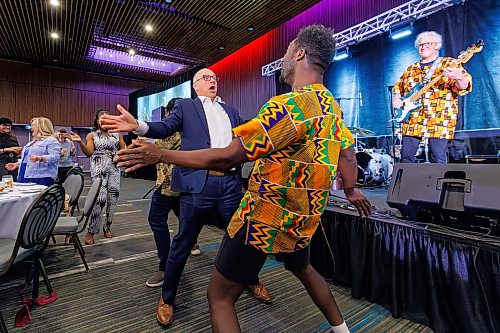 MIKE DEAL / FREE PRESS
Mayor Scott Gillingham dances with NAfro Dance during the luncheon.
Attendees gather at the RBC Convention Centre for the Mayor’s Luncheon for the Arts on Thursday. Along with the awards that were handed out there was a performance by NAfro Dance the only African contemporary dance company in Western Canada which included a special guest dancer and drummer, Mayor Gillingham.
Reporter: Conrad Sweatman
250605 - Thursday, June 05, 2025.