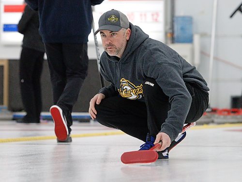 Cale Dunbar looks on as his teammates sweep after delivering a rock during the men's A-side championship. The president of the Westman Superleague is excited for the league to expand to 14 teams this year. (Brandon Sun files)
