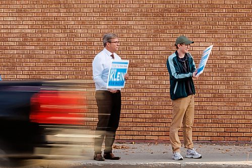 MIKE DEAL / FREE PRESS
8:30 AM
Kevin Klein and his team Burma-shave along St. Mary’s Road during morning rush hour.
Kevin Klein (left) and Wells Mayes (right), Klein’s operations director.
For day-in-the-life story.
Reporter: Malak Abas 
261005 - Monday, October 05, 2026.